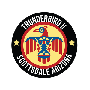 Thunderbird II Scottsdale Arizona logo featuring a stylized red, blue, and gold thunderbird inside a circular black badge with stars and white lettering.
