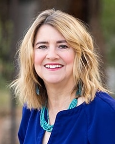 An outdoor portrait of Senator Laura Kuby.