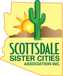 Scottsdale Sister Cities Association logo featuring cactus, sunrise, mountains, and Arizona state outline.